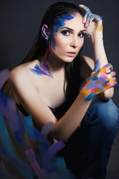 Girl in colorful paints — Stock Photo, Image