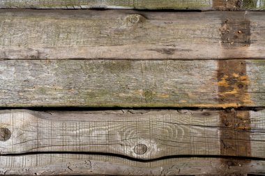Eski ahşap tahtalar, çok görünür ahşap tahtalar ve düğümler.