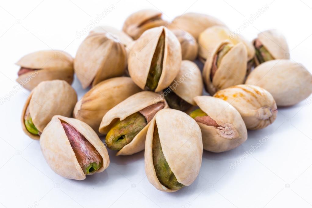 Pistachio nuts. Isolated on a white background.
