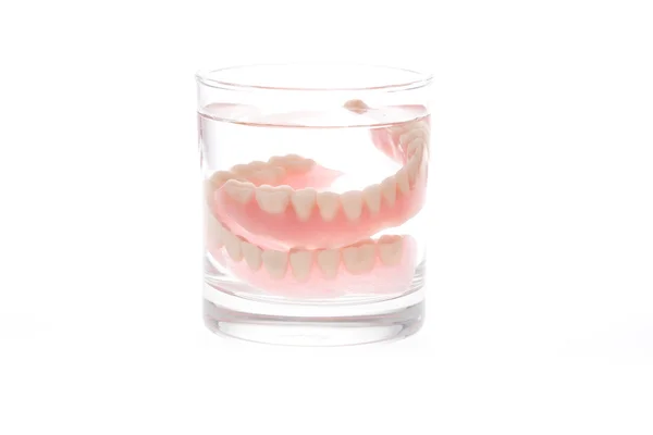 Full Denture in glass of water — Stock Photo, Image