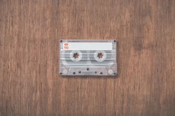 Cassette tape on wooden background — Stock Photo, Image