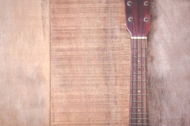 Grunge ukulele ahşap arka plan üzerinde Close-Up