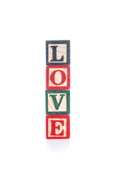 Photo d'un alphabet blocs orthographe LOVE isolat sur fond blanc — Photo