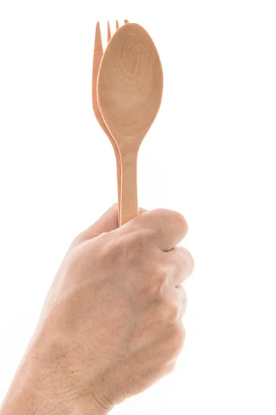 Uomini mano tenendo cucchiaio e forchetta di legno — Foto Stock