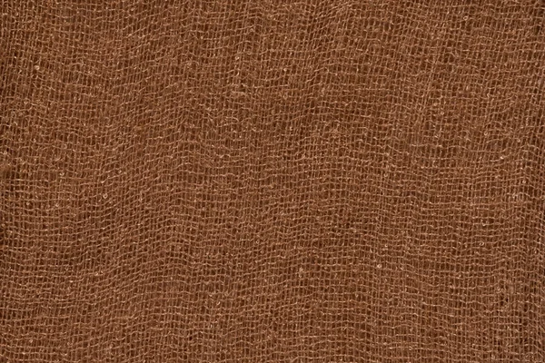 Hnědé bavlněné textilie textura pozadí — Stock fotografie