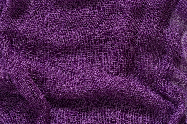 Violet verfrommeld stof textuur achtergrond — Stockfoto