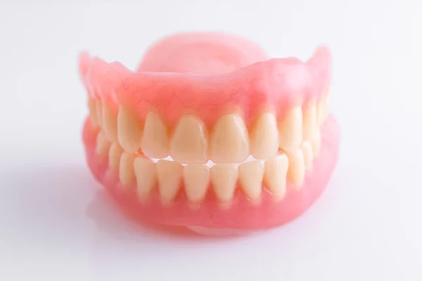 Full denture on white background — Stock Photo, Image