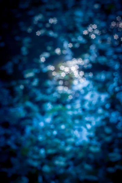 Bokeh de estrella abstracta con fondo borroso —  Fotos de Stock