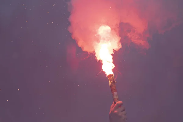 Fire torch from a football supporter
