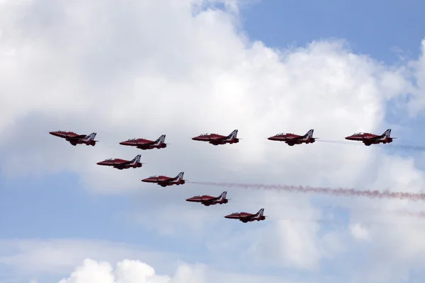 Team the red arrows in action — Stock Photo, Image