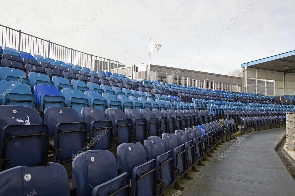 Empty Plastic Chairs at the Stadium