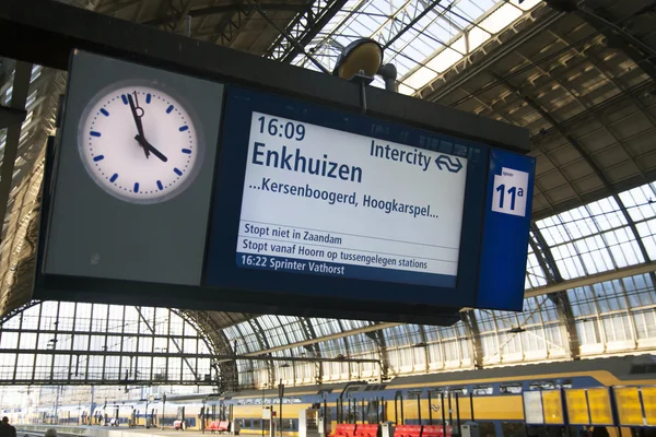 Passenger sign on the Central railway station of Amsterdam — Stock Photo, Image