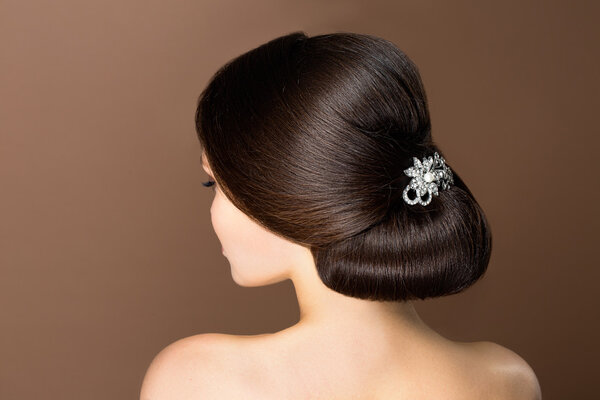 Beautiful sensual brunnete with elegant hairstyle.Beauty wedding