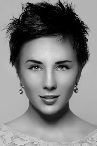 Portrait of a beautiful young girl with short hair. Black and wh — Stock Photo, Image