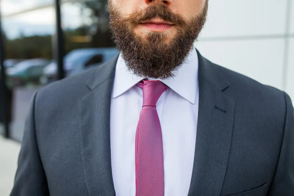 Portrait of a young bearded businessman. Close up. — Stock Photo, Image