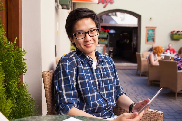 Asian student with digital tablet — Stock Photo, Image