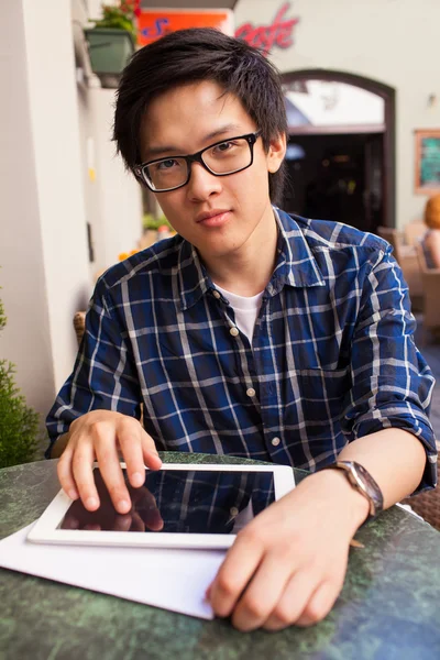 Asian student with digital tablet — Stock Photo, Image