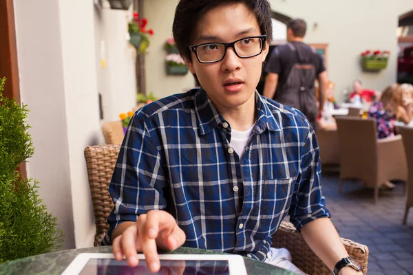 Asian student with digital tablet — Stock Photo, Image