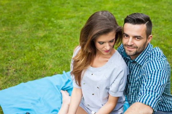 Couple spending great time on blanket — Stock Photo, Image
