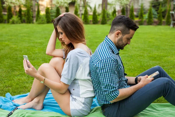 Couple spending time on blanket — Stock Photo, Image