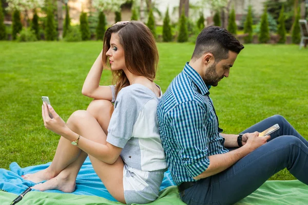 Couple spending time on blanket — Stock Photo, Image