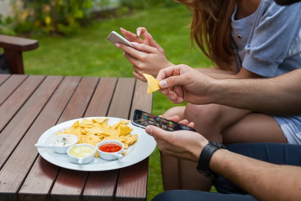 Close-up of eating tortilla-chips — Stock Photo, Image