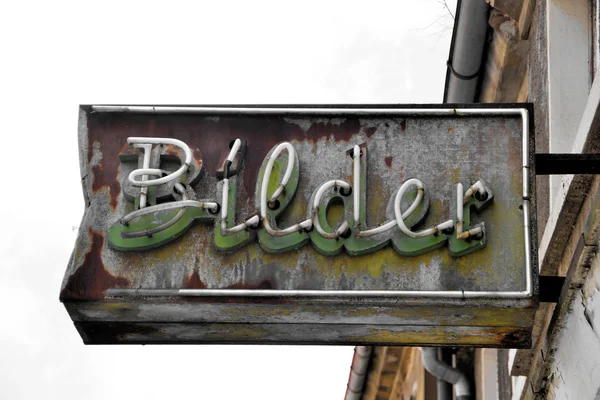 Old dilapidated neon sign — Stock Photo, Image