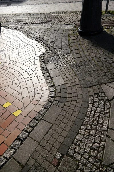 Footpath with different cobbles — Stock Photo, Image