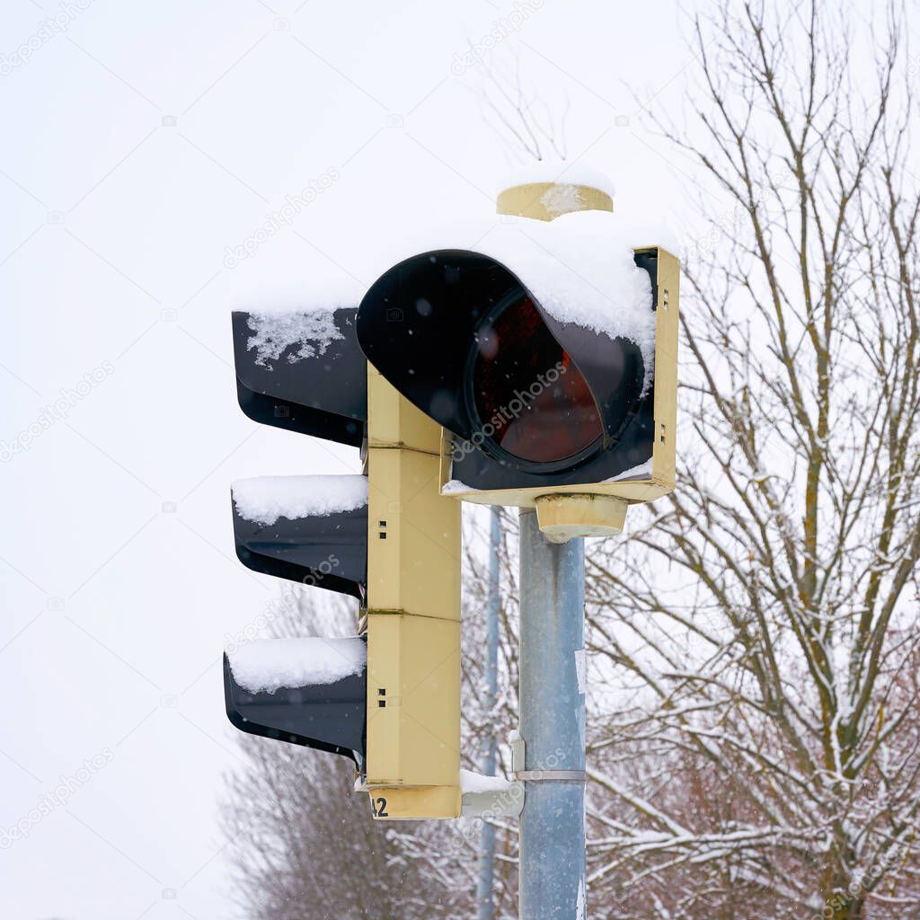  Traffic lights at an intersection in Magdeburg in Germany in winter                              