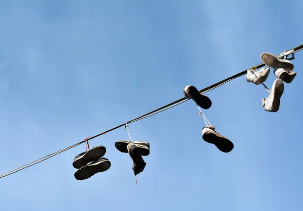 Hanging shoes — Stock Photo, Image