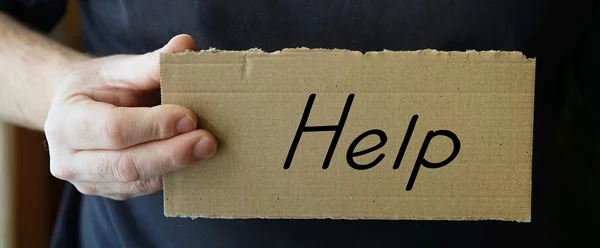 Ondertekenen met het woord "help" — Stockfoto