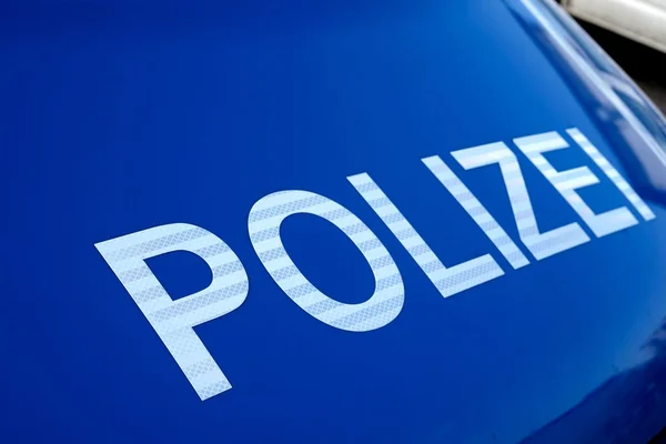 Polizeiauto am Straßenrand — Stockfoto