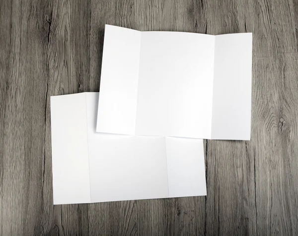 Blank gate fold brochure on wooden background to replace your de — Stock Photo, Image