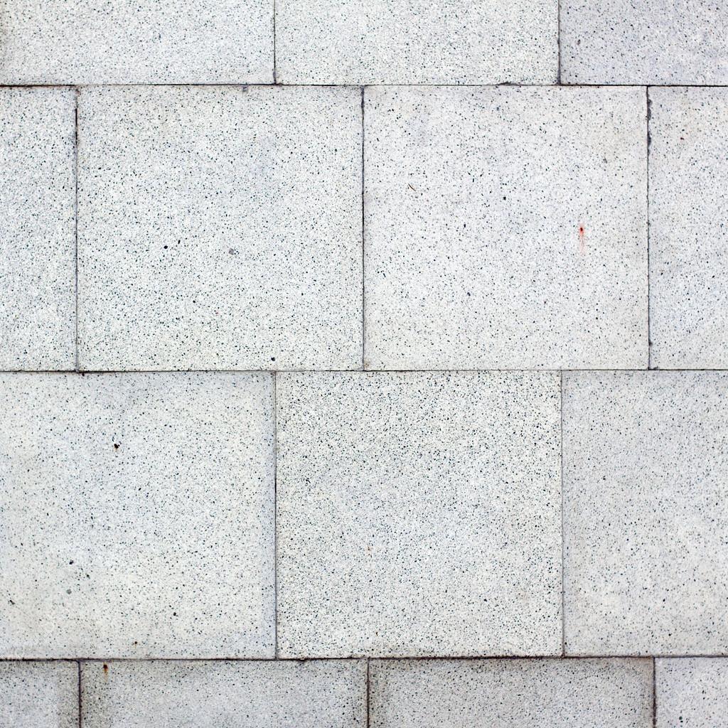 Losas o piedras de pavimento cuadradas de hormigón o adoquín gris para