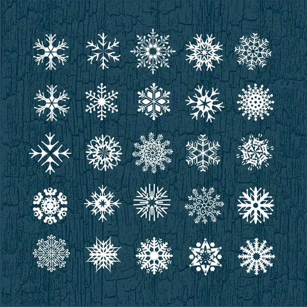 Weiße Schneeflocken auf blauem Hintergrund — Stockvektor