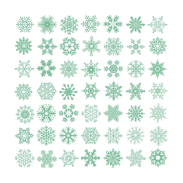 Collection of green snowflakes on a white background — Stock Vector