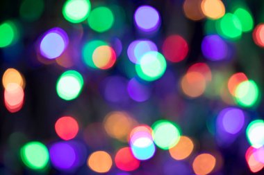 Renkli Bokeh soyut arkaplanı. Noel tatilinde dekorasyon