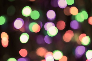 Renkli Bokeh soyut arkaplanı. Noel tatilinde dekorasyon