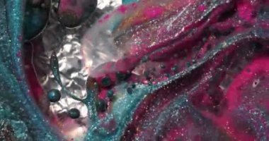 Sıvı boya sıçrama ve girdapla karıştırılmış sanat eserleri.