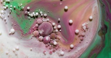 Sıvı boya sıçrama ve girdapla karıştırılmış sanat eserleri.