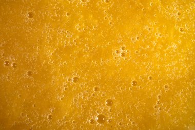 Suda sarı yağ kabarcıkları, yağda pişirme arka planı