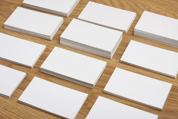 Blank business cards on a wooden background — Stock Photo, Image