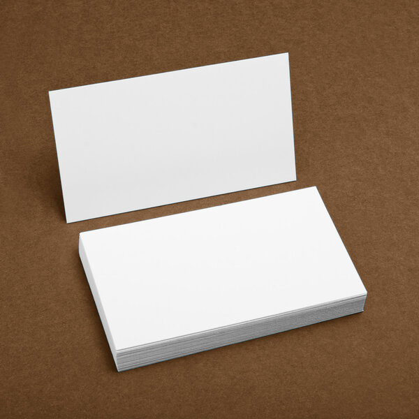 Blank business cards on a brown background