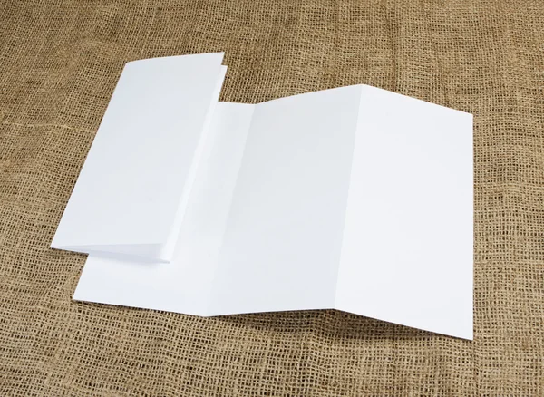 Blank white folding paper flyer — Stock Photo, Image