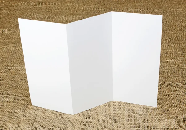 Blank white folding paper flyer — Stock Photo, Image