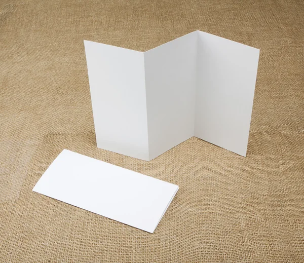 Blank white folding paper flyer Royalty Free Stock Photos