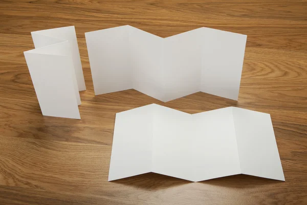 Blank white folding paper flyer — Stock Photo, Image