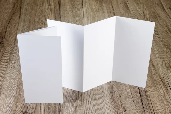 Blank white folding paper flyer — Stock Photo, Image