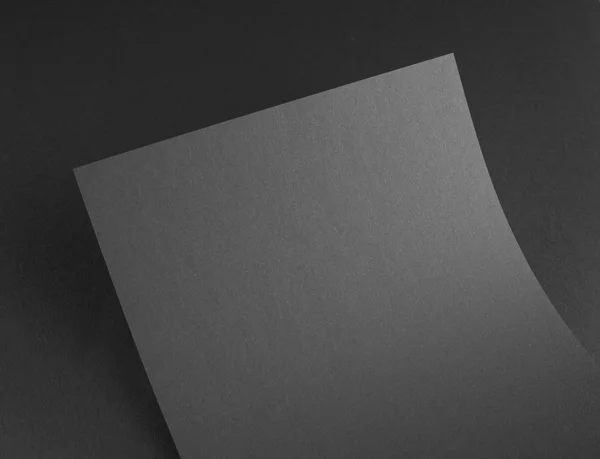 Blank flyer poster on grey to replace your design. — Stock Photo, Image
