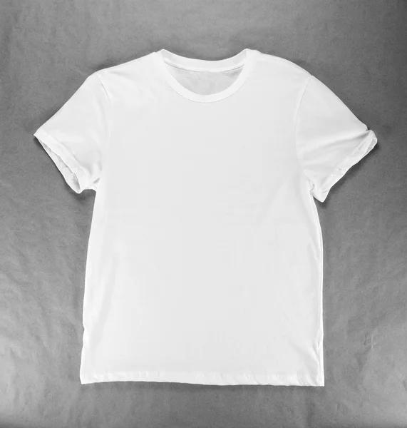 Branco dobrado t-shirt modelo — Fotografia de Stock